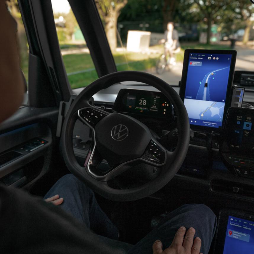 safety driver monitoring the ride inside the autonomous vehicle